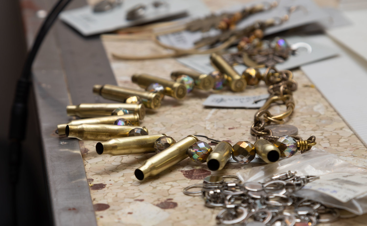 Bullet casings become jewelry in Anne Jansen's capable hands. She sells the jewelry line at surshotjewelry.com.