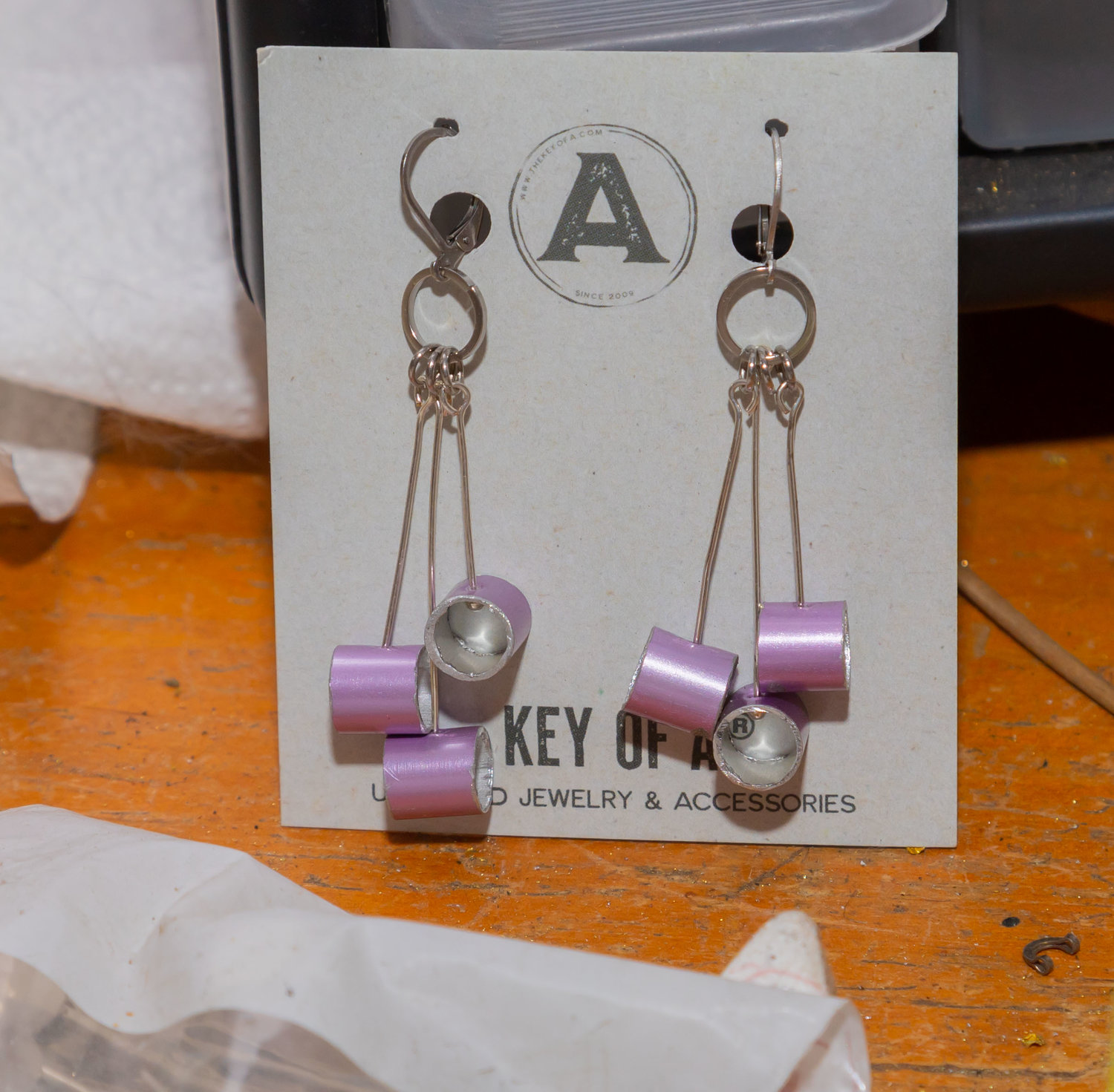 Pieces of knitting needles become earrings at Key of A, a jewelry company that upcycles discarded items.
