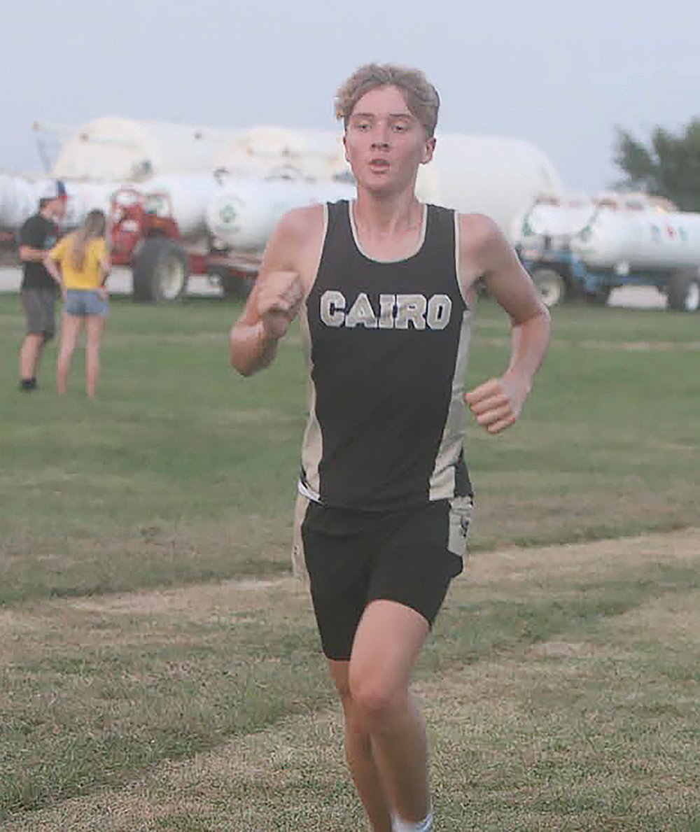 Cairo's Shaun Luecke runs during the varsity boys' race at Monday's Wellsville-Middletown meet.