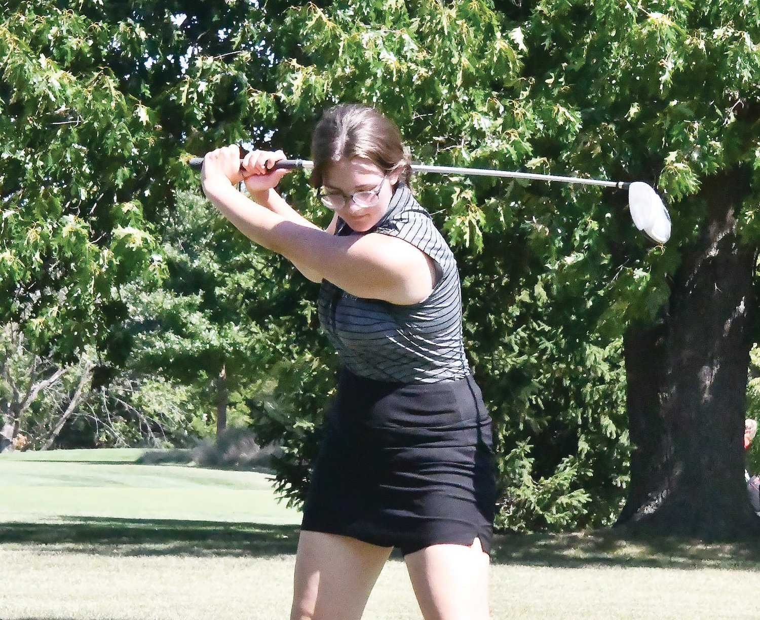 Cairo's Addison Pollard prepares to drive the ball during Tuesday's scramble tournament in Columbia. Harrisburg School District served as the host.