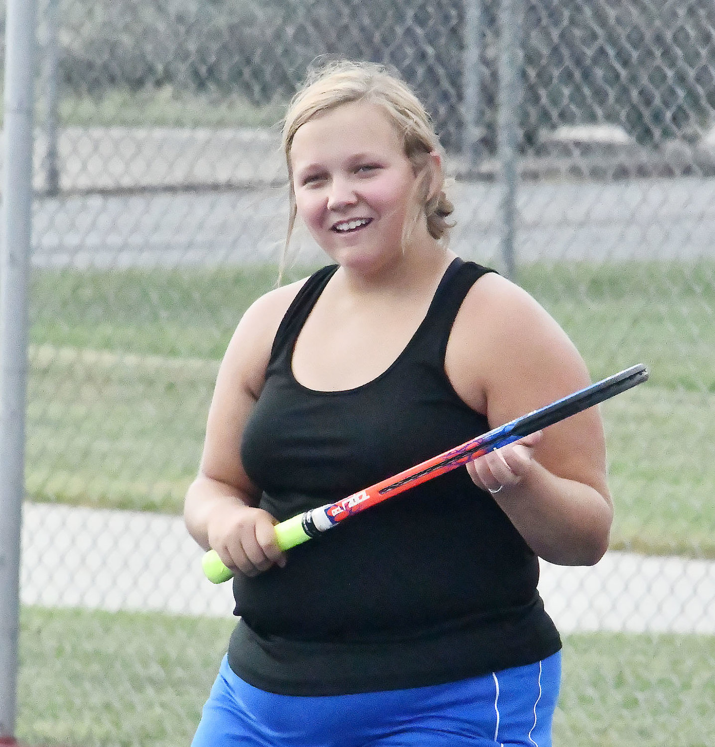 Rachael Morgan smiles after winning a point during Wednesday's match against Boonville, before it was canceled.
