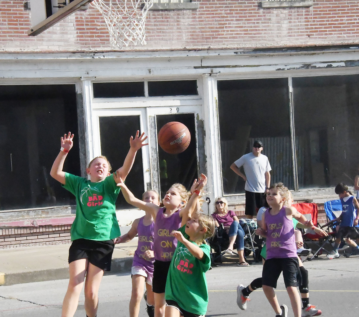 It was Girls on Fire (purple) versus Bad Girls (green) in this heated game on the girls' court.
