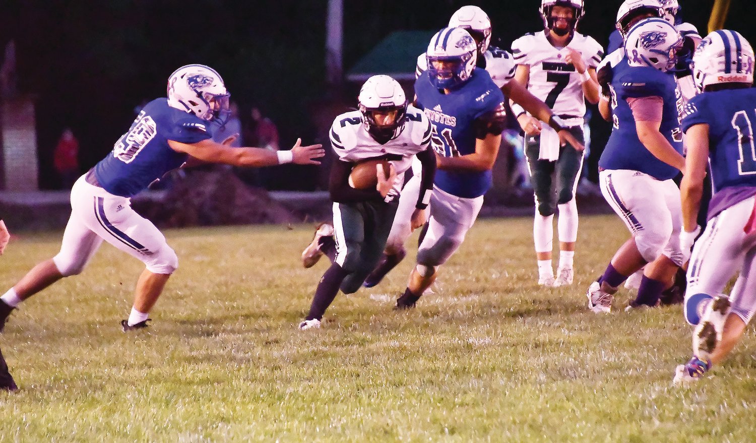 Westran's Nathaniel Kribbs bursts through to the second level on a big gain during Friday's game. Kribbs later scored a TD on an 83-yard kickoff return.