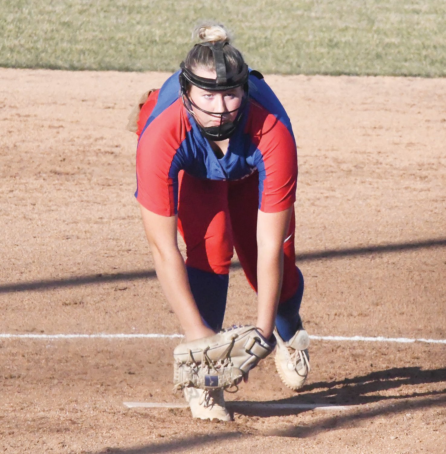 Moberly pitcher Taylor Martin stares down the sign from home plate before throwing as the Spartans played Cairo Tuesday.