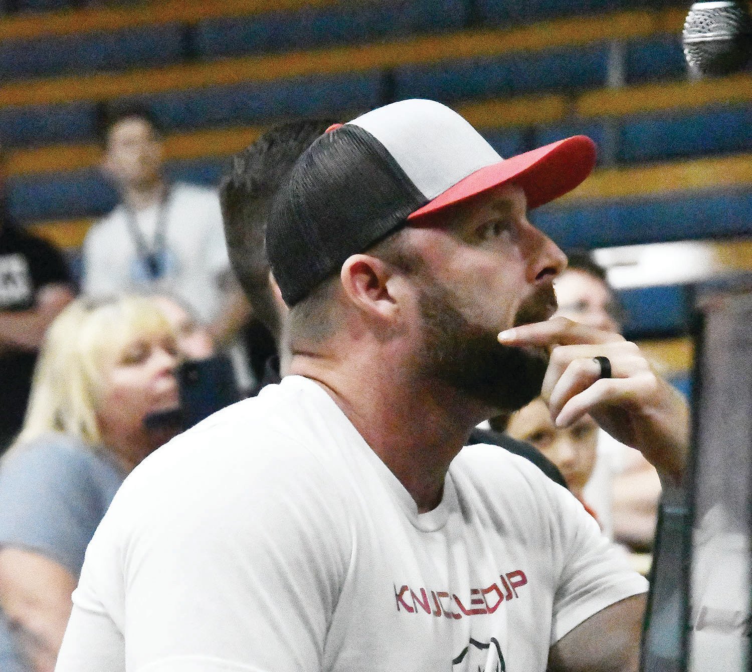 Promoter Ricky Davidson observes one of the fights next to the cage. Several local mixed martial artists and kickboxers showcased their wares during Fight Show X on Saturday, Sept. 24.