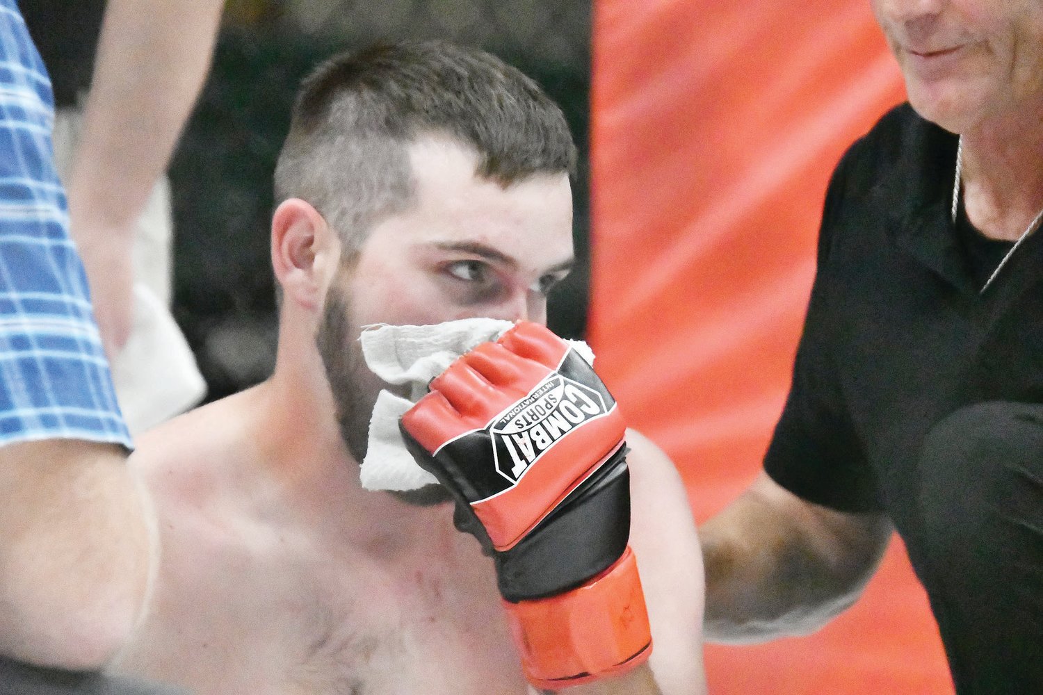 Lucky Gladstone suffered a bloody nose during his mixed martial arts bout with Michael Harper of Kirksville. Harper won at the 2:59 mark of the first period on strikes. Dr. Michael Roach and referee Mike England attended to Gladstone after the match.