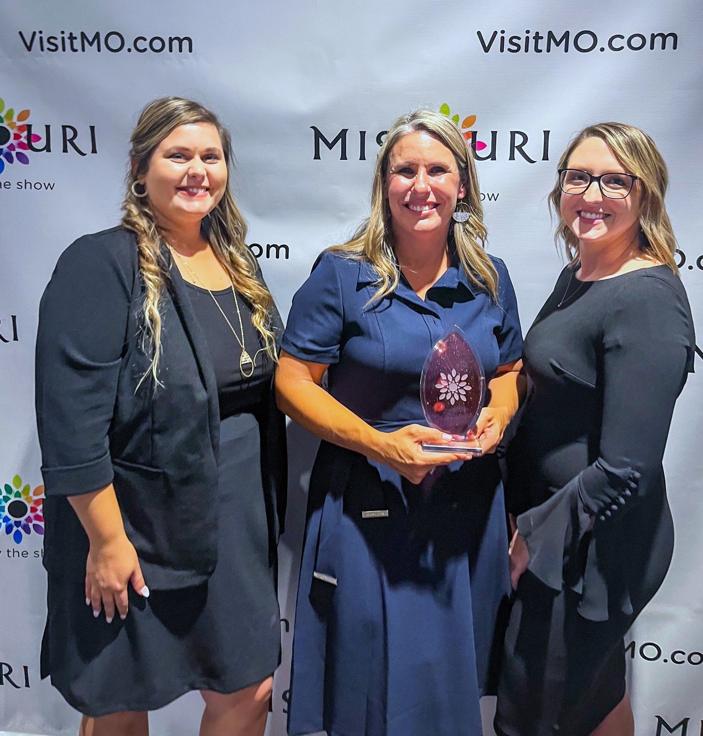 Accepting the Innovator Award last week are Tourism Specialist Michelle Greenwell, Moberly Area Chamber of Commerce Executive Director Megan Schmitt and Administrative Assistant Ashley Nolte.