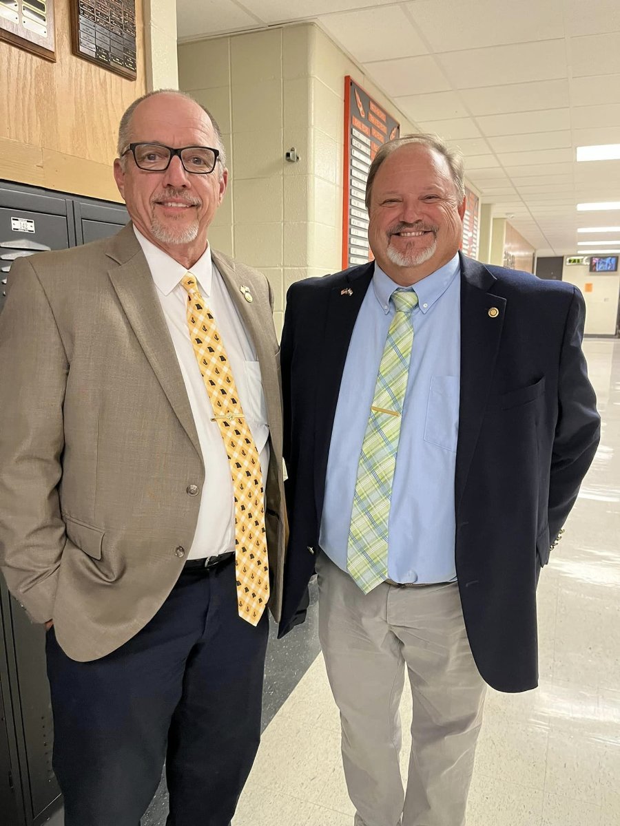 In this October 2022 file photo, State Rep. Ed Lewis visits with Hugh Dunn at Macon High School. Lewis has sponsored a House bill that would allow school boards to offer higher salaries than the usual schedule in order to fill positions that had been unfilled, or filled by an unqualified person, for more than one year.