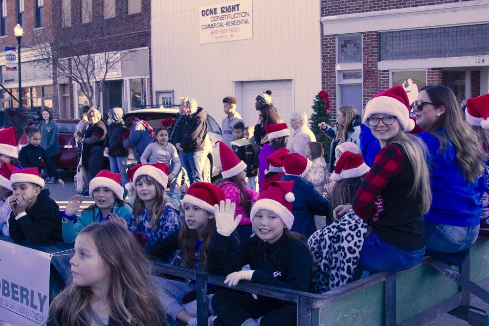 In this December 2021 file photo, children don Santa hats for the annual Christmas Festival Parade in Moberly. The Moberly Area Chamber of Commerce requested parking restrictions from the city for this year's festival, which is set for Saturday, Dec. 3.