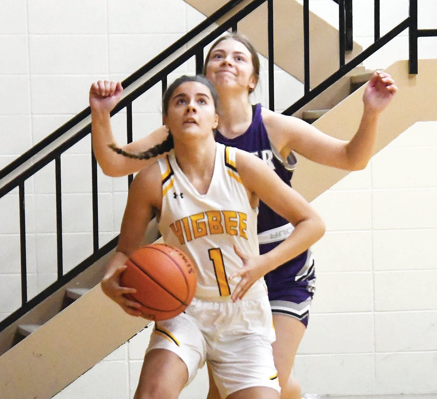 Ronnie Welch eyes the basket during Tuesday's girls' basketball game between Higbee and Bevier.