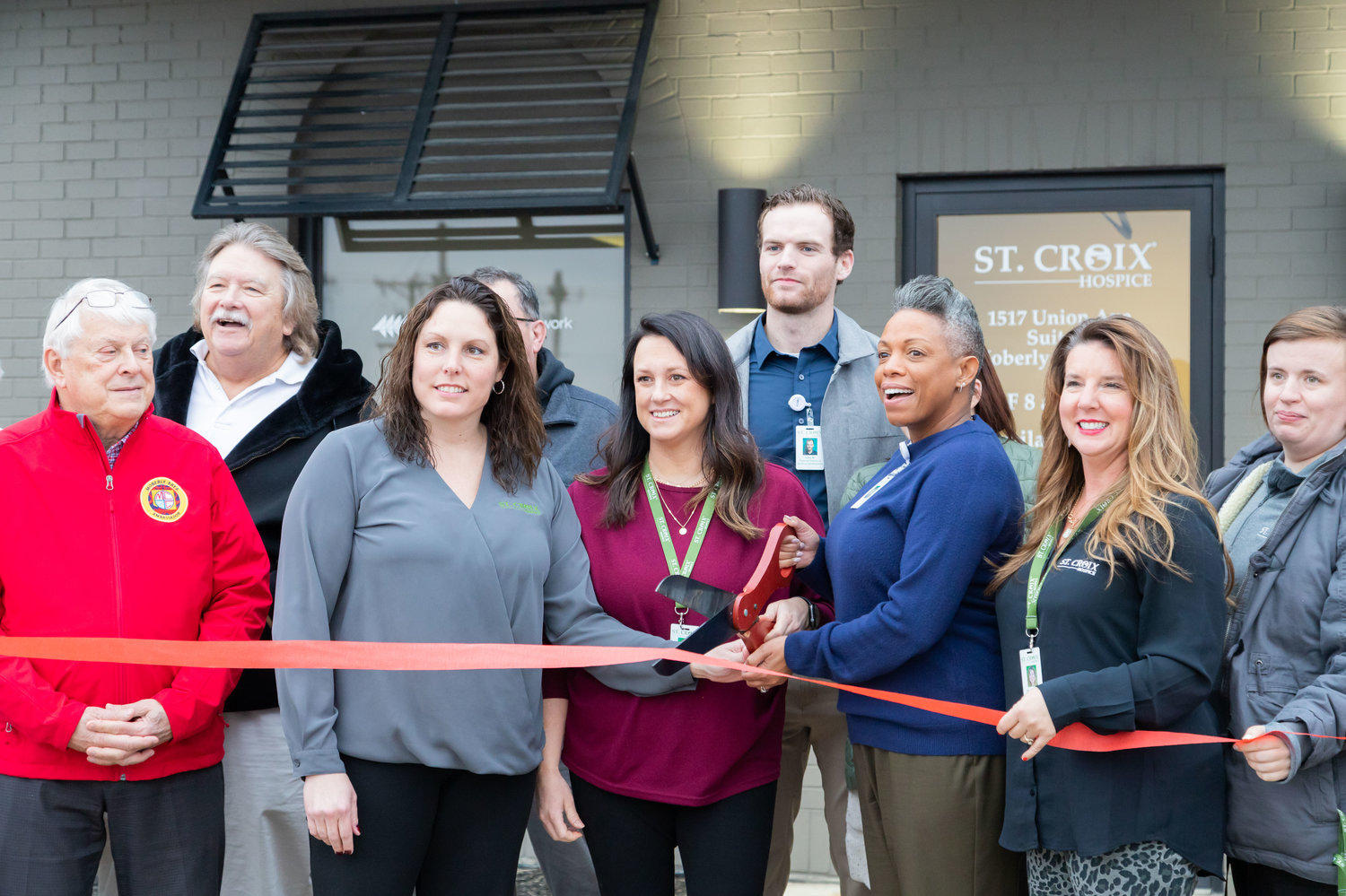 Moberly Area Chamber of Commerce Ambassadors and St. Croix Hospice Staff celebrate a new location for the hospice during a ribbon-cutting last week. Staff in the photo are Schelly Jordan, Emily Davenport, Luke Matheny, Leslie Earls, Rachel Choate and Kaitlyn Baker.