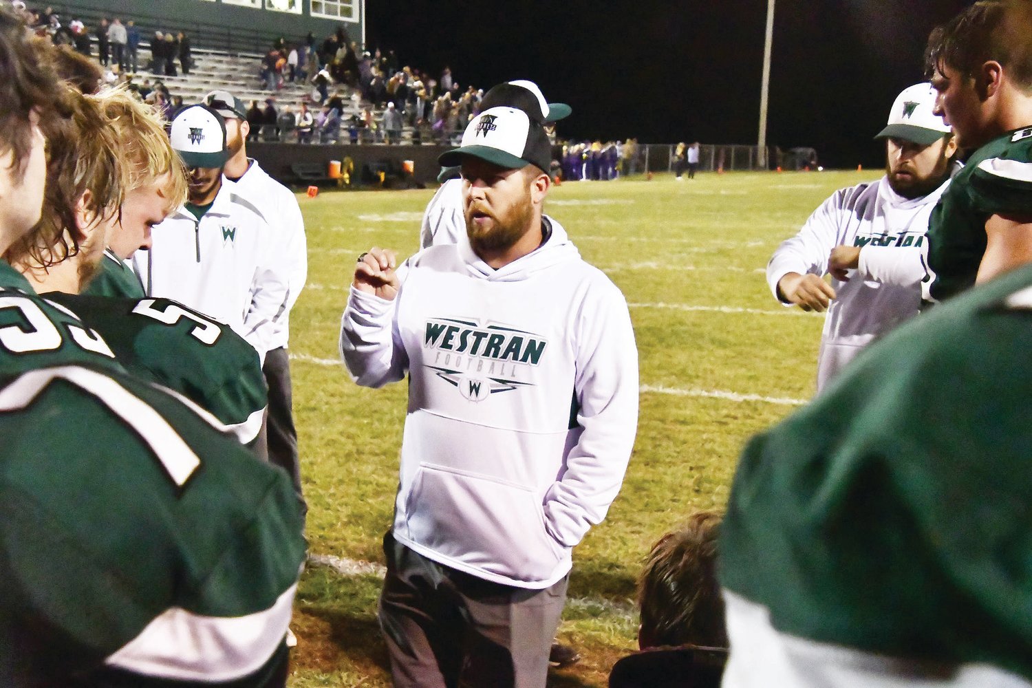 Westran head football coach Aaron O'Laughlin talks to his team after the Hornets defeated Salisbury during the opening round of the Class 1 playoffs on Thursday, Oct. 27, 2022, in Huntsville. O'Laughlin announced his resignation last Tuesday after five years.