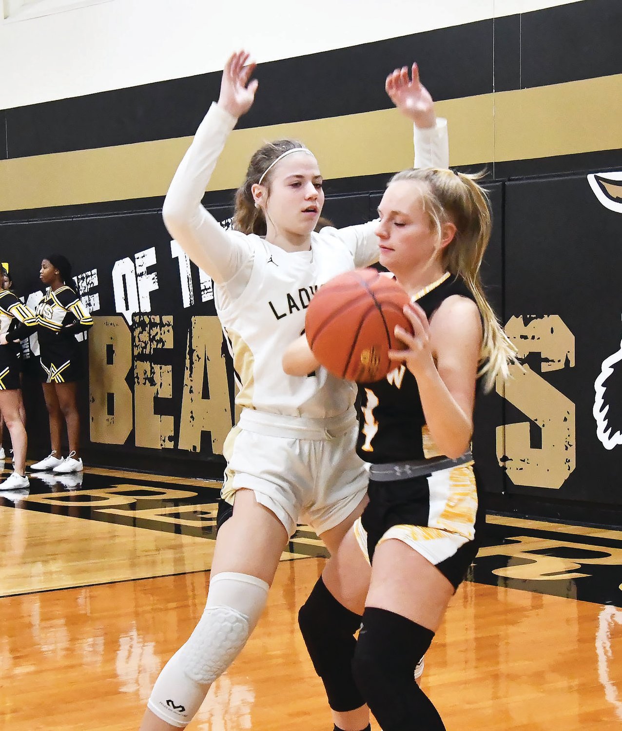 Olivia Cross plays tough defense on Macie Parks from Glasgow during a Central Activities Conference game in Cairo on Thursday, Jan. 12.