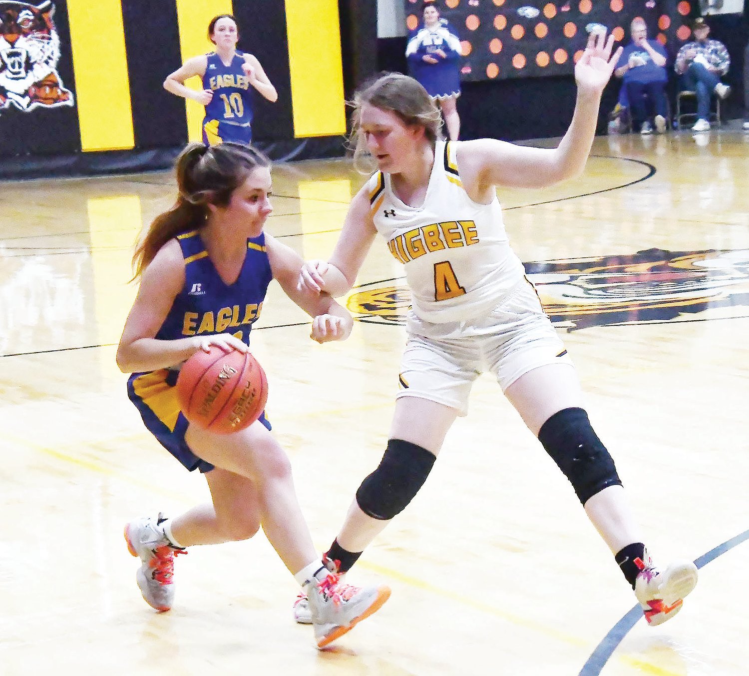 Emma Johnson (4) defends during a Carroll Livingston Activities Association girls basketball game versus Northwestern (Mendon) on Friday, Jan. 13. The Tigers defeated the Eagles, 75-28.