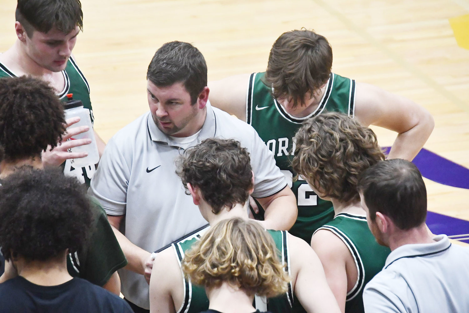 Westran head coach Chris Sander draws up a play during Friday's Lewis & Clark Conference game at "The Dome."
