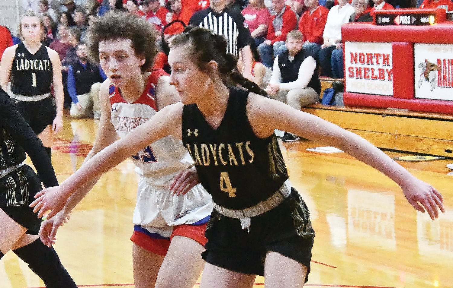 Cairo High School's Kennedy Kearns (4) attempts to box out South Shelby's Mille Mozee-Williams during Saturday's North Shelby Tournament girls' basketball championship game.