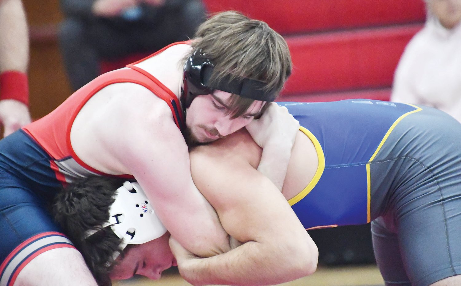 Moberly High School senior 175-pounder Gannon White locks the head of Fatima's Chase Willis during a bout at a Spartan home triangular on Tuesday, Jan. 24. White was celebrated before the meet. He eventually pinned Willis in 3:38.
