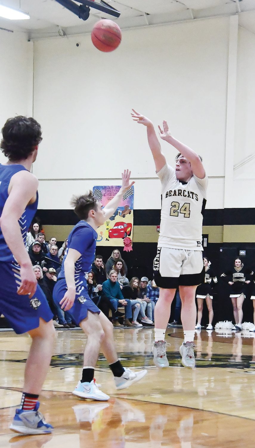 Cairo High School's Ryan Tracy attempts a 3-point shot during the first half of Friday's game versus New Franklin.