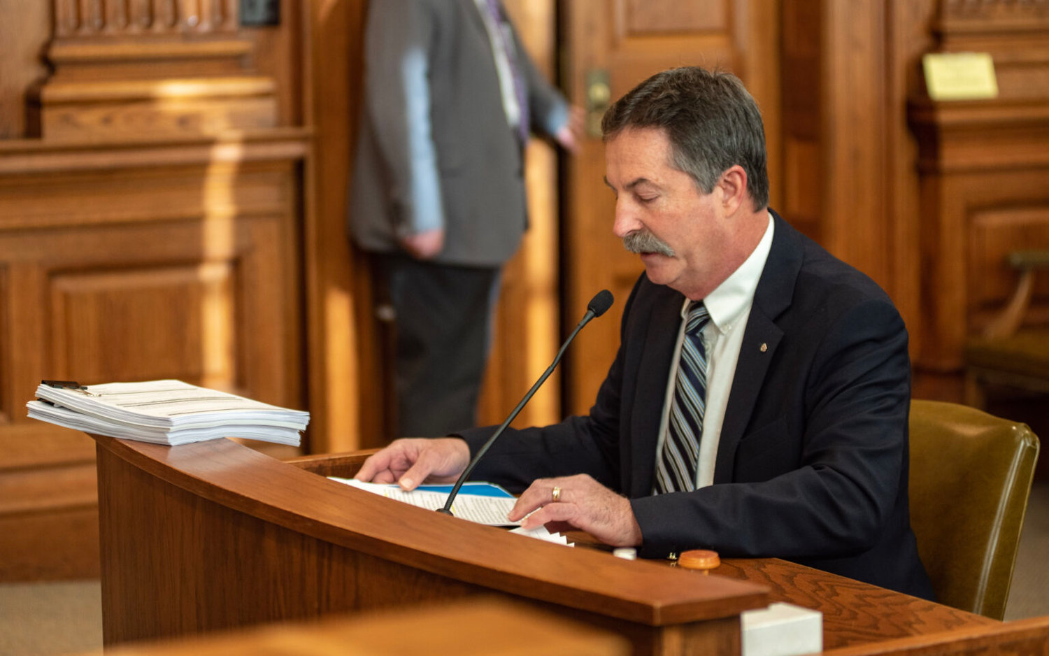 State Sen. Mike Moon, R-Ash Grove, introduces his bill opponents are labeling a "Don't Say Gay" bill before the Senate Education and Workforce Development Committee Tuesday. A thick stack of witness forms sits on the desk.