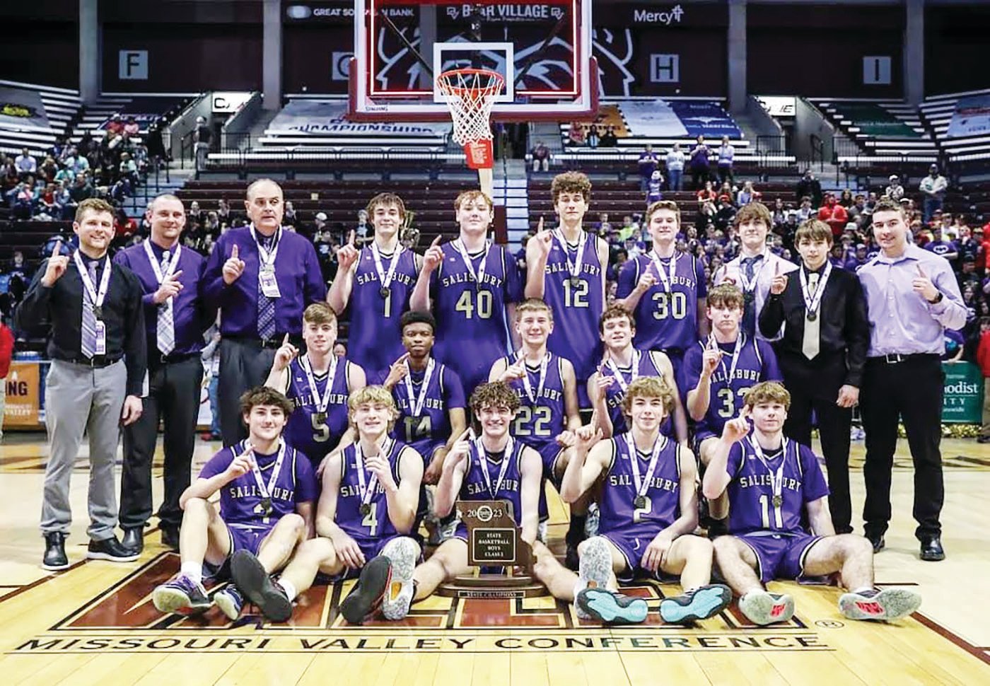 The Salisbury High School boys basketball team gathers for a photo after winning the Class 2 state championship in Springfield on Saturday night.
