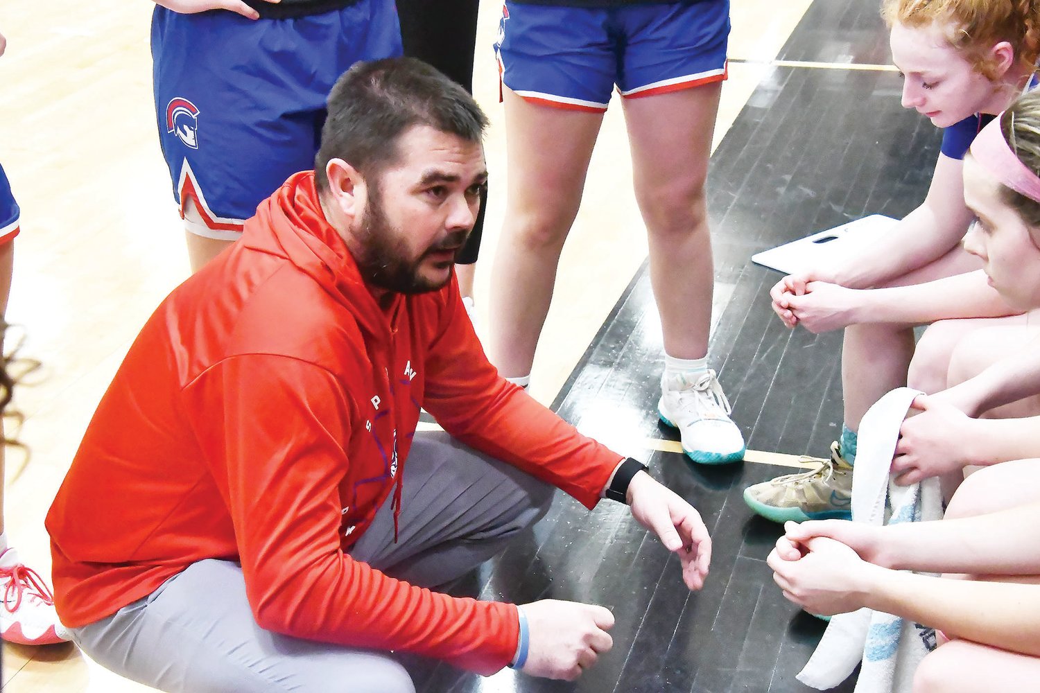 Coach Tony Vestal talks to his team during a timeout in Saturday's Class 4 girls quarterfinal game.