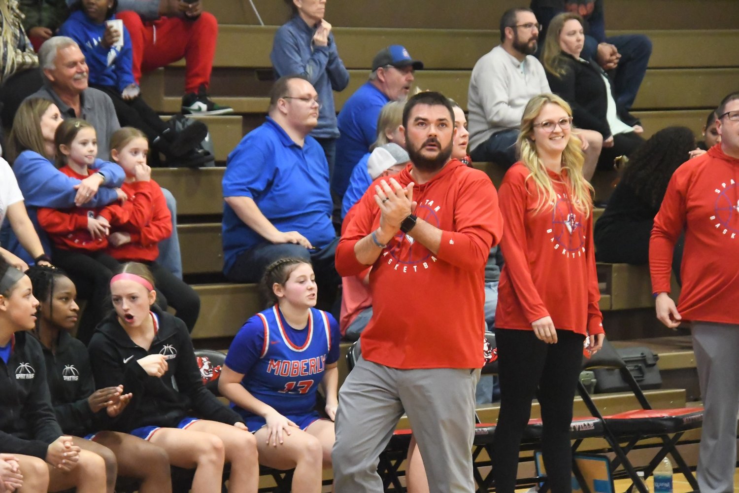 Moberly head coach Tony Vestal claps late during the fourth quarter of a Class 4 sectional game versus Visitation Academy Tuesday, March 7.