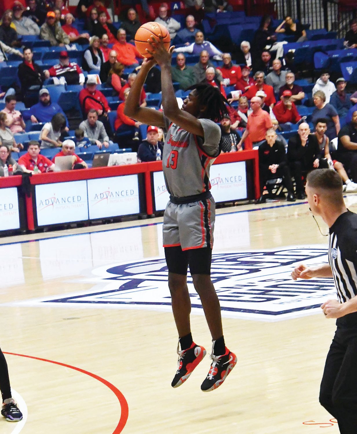 Ade Popoola attempts a 3-point shot during the first half of an NJCAA Division I tournament game versus Dodge City on March 22.