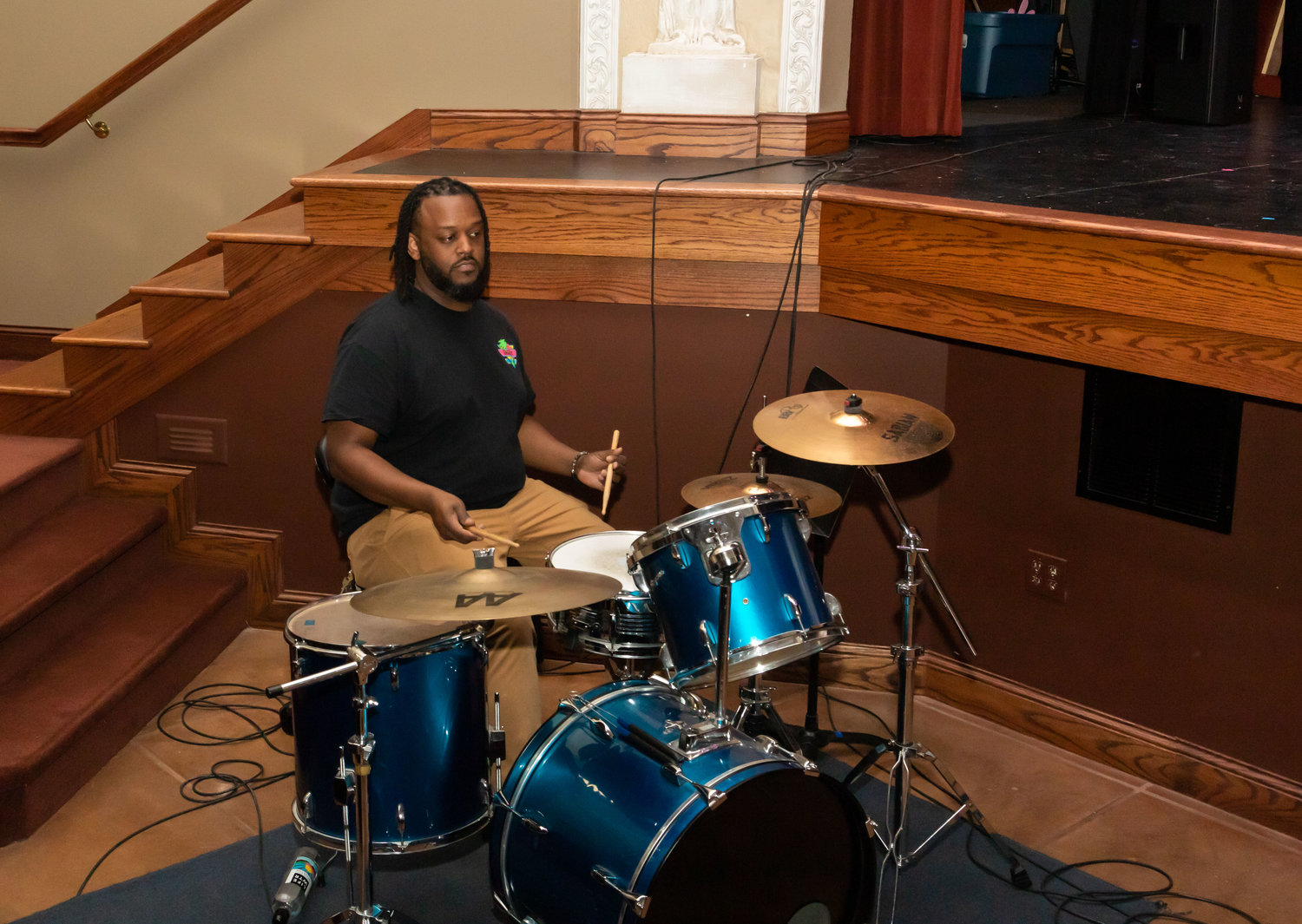 Derrick Enyard plays drums for "You're a Good Man, Charlie Brown."