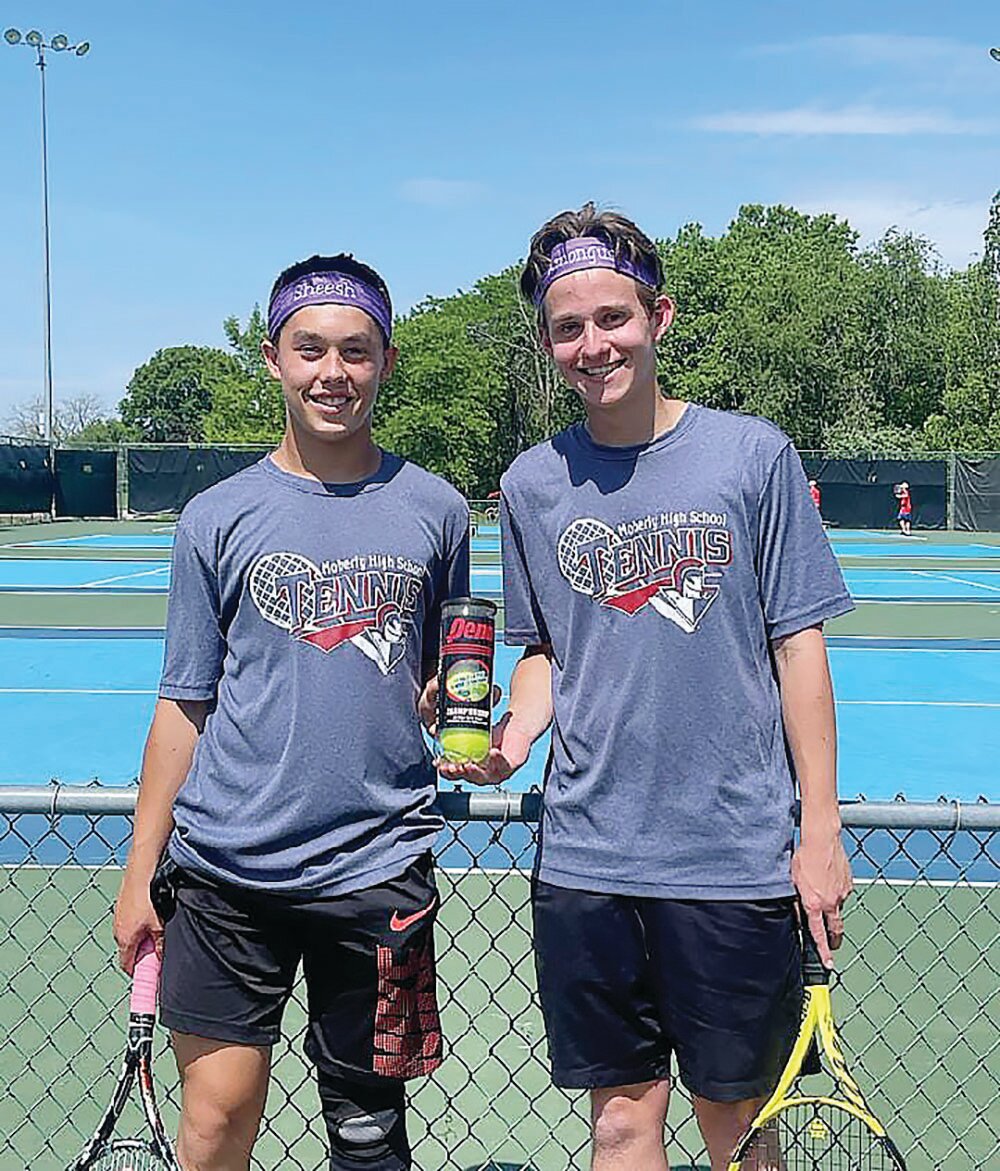 Moberly's Ryan O'Loughlin and Max Meystrik smile after winning their Class 1 sectional boys tennis match at Cosmopolitan Park in Columbia last Saturday.