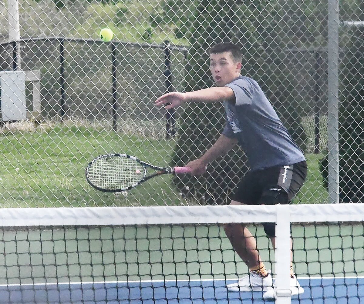Moberly's Ryan O'Loughlin prepares a forehand shot during the Class 1 District 7 team tennis semifinals on Tuesday, May 9, at Truman State University in Kirksville.