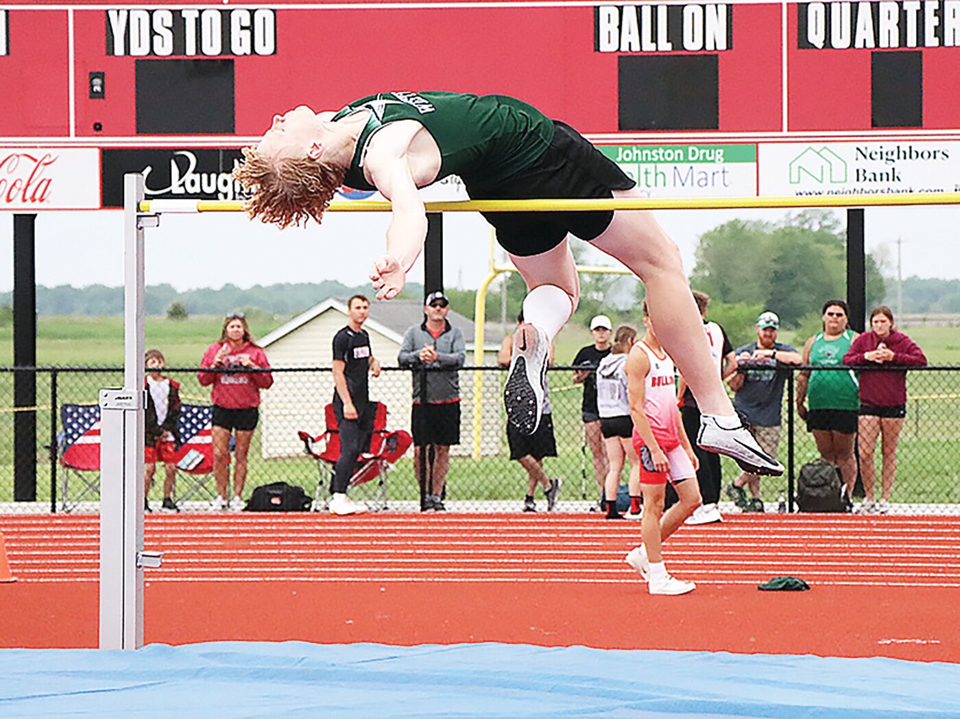 Westran's Sam Harlan clears the bar during the Class 2 Section 2 track and field meet on Saturday at South Shelby High School in Shelbina.
