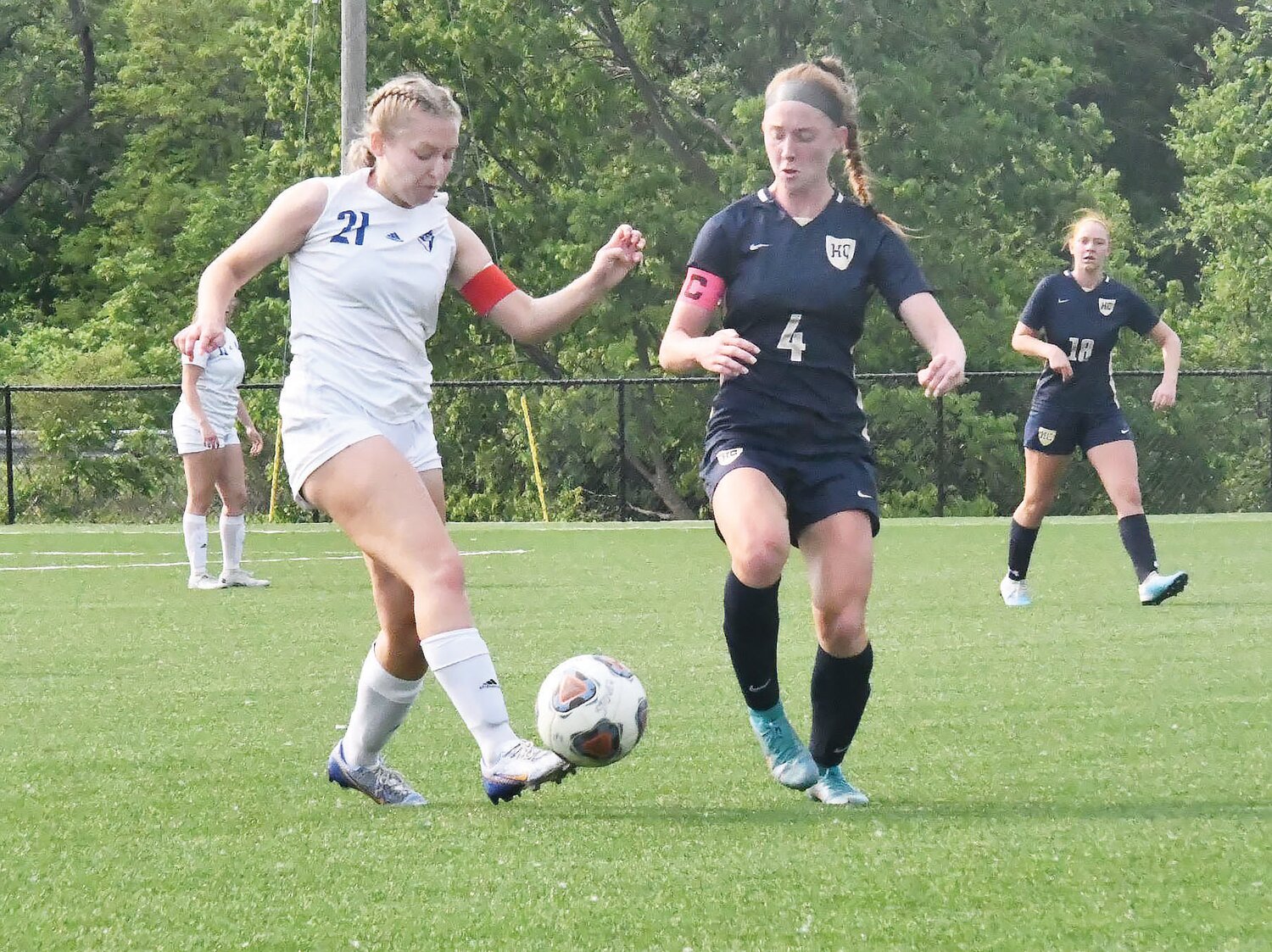 Moberly senior defender Macy White (left) played in her final scholastic soccer match on Wednesday, May 17, in Boonville.
