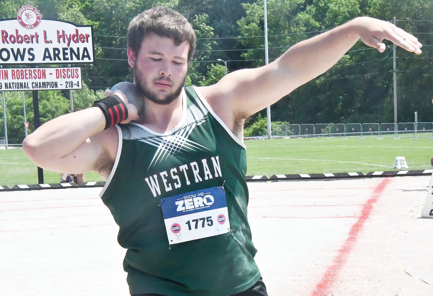Westran's Brenin Howell competes during the Class 2 boys' shot put preliminaries at the state track and field meet.