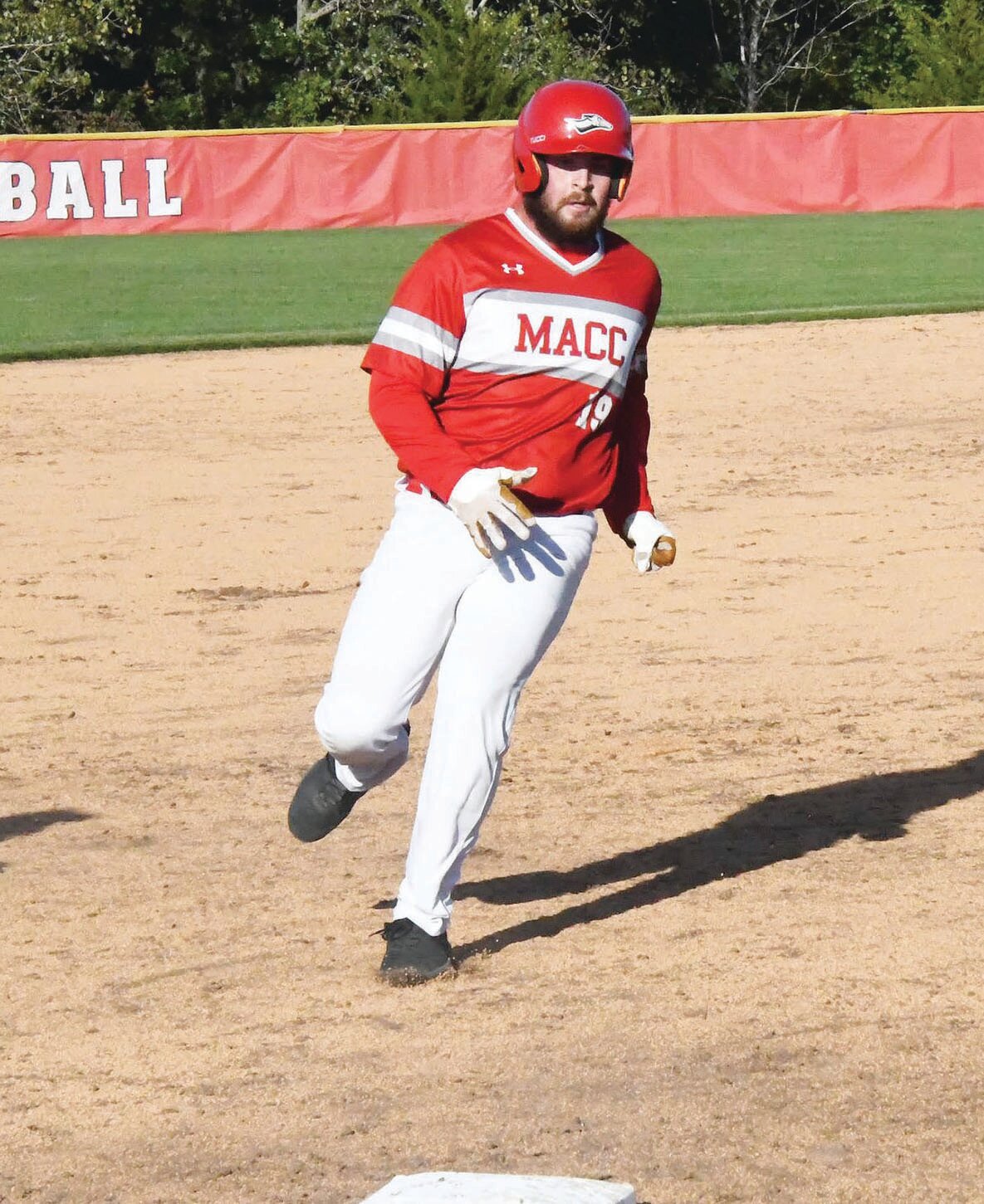 Jack Prewett runs toward third base during a fall semester game at Howard Hils Athletic Complex.