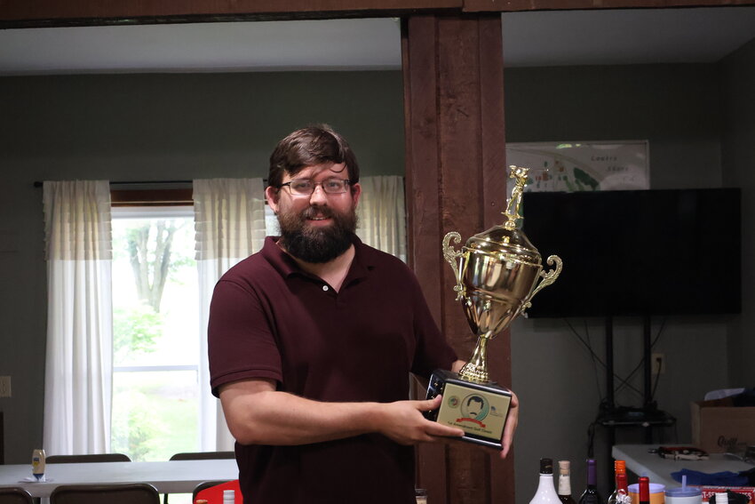 Jacob Warden is this year's recipient of the traveling trophy awarded to participants in the Missouri Press Foundation's annual Kevin Jones First Amendment Golf Classic. The trophy is awarded to individuals who embody the spirit of camaraderie that the golf tournament promotes within the Missouri newspaper industry and among its friends.