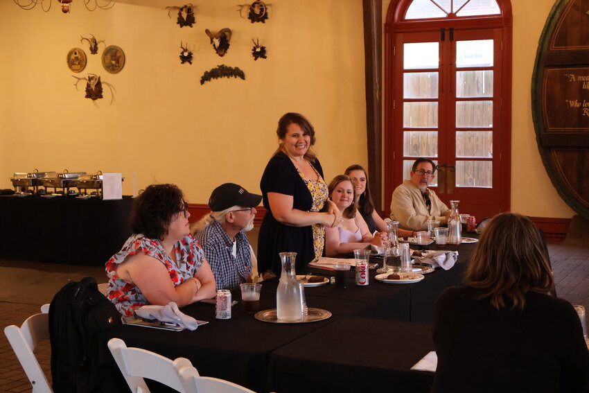 Roxie Murphy, president of Show-Me Press Association, kicks off this year's meeting with introductions before diving into presentations on newspaper branding, investigative reporting and fighting disinformation.