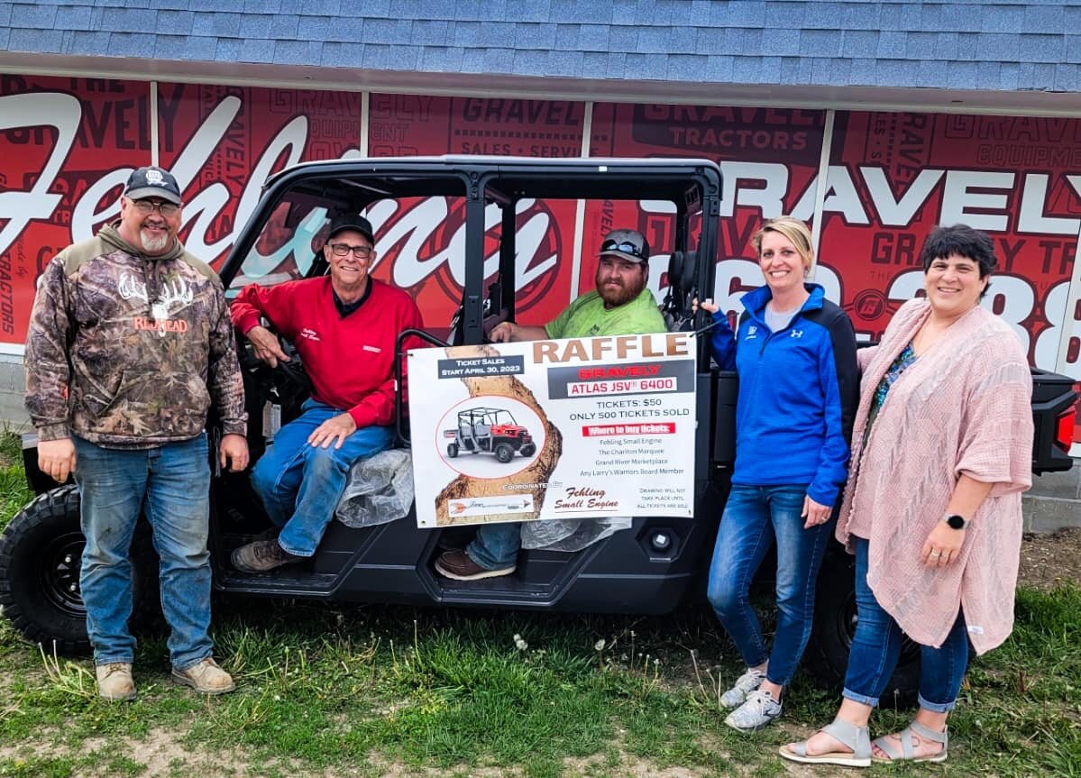 The Larry’s Warriors Foundation announced a raffle of a Gravely Atlas side by side in 2023. Shown with owners of Fehling Small Equipment where the side by side was purchased from.