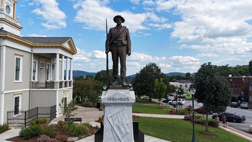 The Confederate soldier has stood atop the monument since 1918.