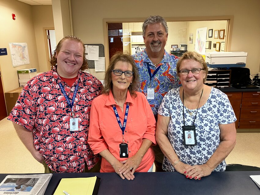 Shown above, from left, is the staff of the Burke County Board of Elections office: Trent Price, Amy Moore, Kenny Rhyne, and Director Debbie Mace.