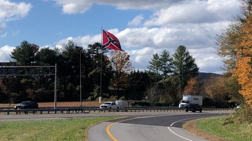 A large Confederate flag adjacent to the Hildebran exit on I-40 in eastern Burke County.