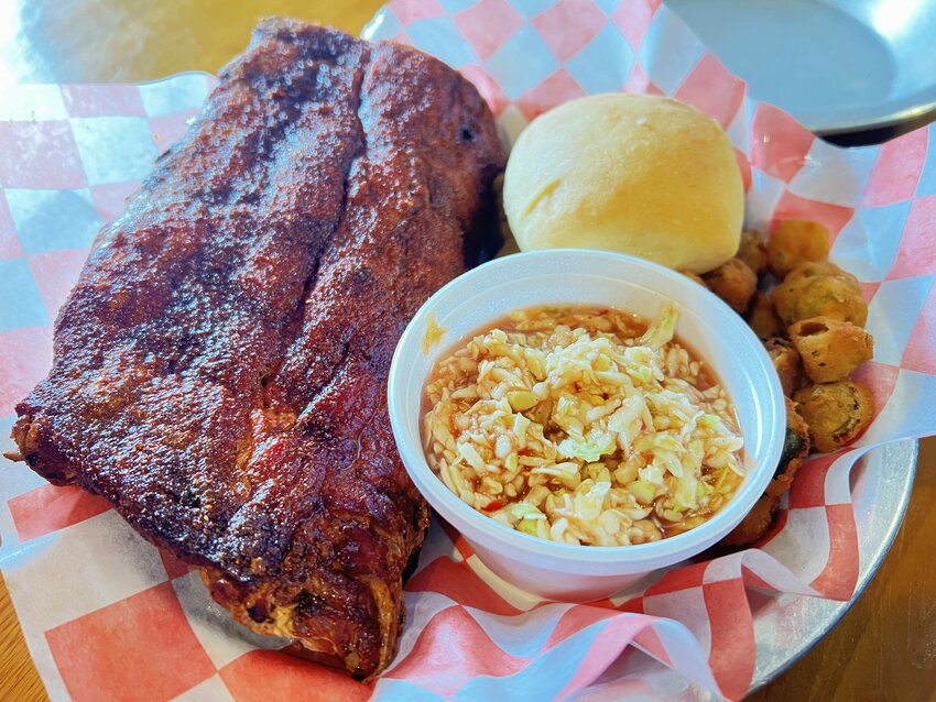 The ribs plate here is shown with red slaw and fried okra. The half rack of ribs served at JD's had more meat than full racks at some other restaurants.