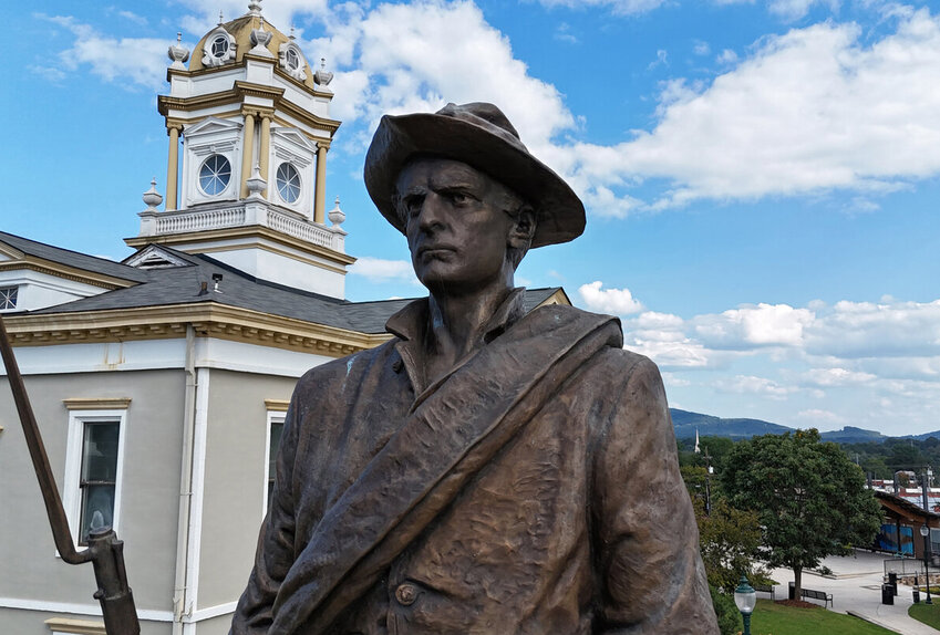 The face of the Confederate soldier who has stood watch over downtown Morganton on the Historic Courthouse Square for more than a century.