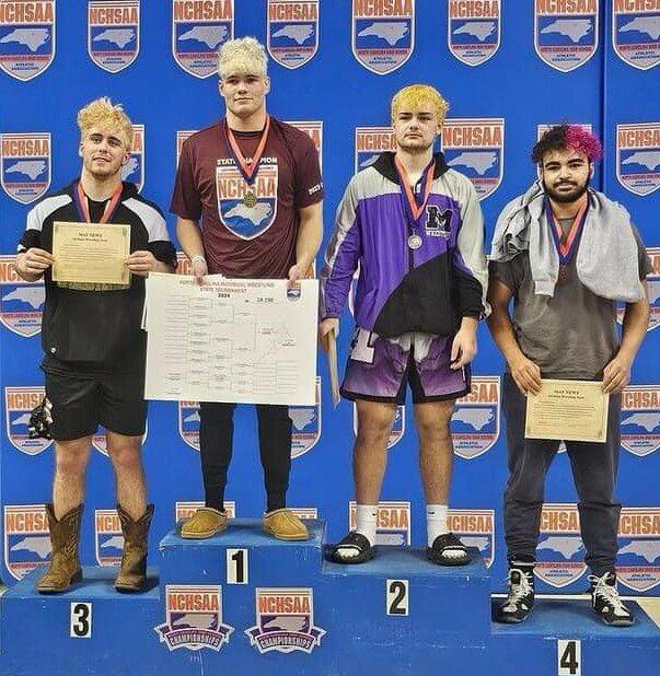 Draughn senior wrestler Hampton Blackwell (far left) finished third place in his 1A 190-pound draw at the NCHSAA state championships from Feb. 15-17 in Greensboro.
