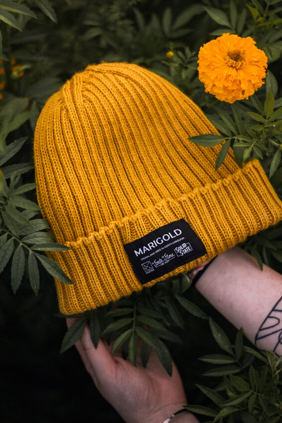 Marigolds provide the basis for the dye used on the distinctive Marigold beanie.