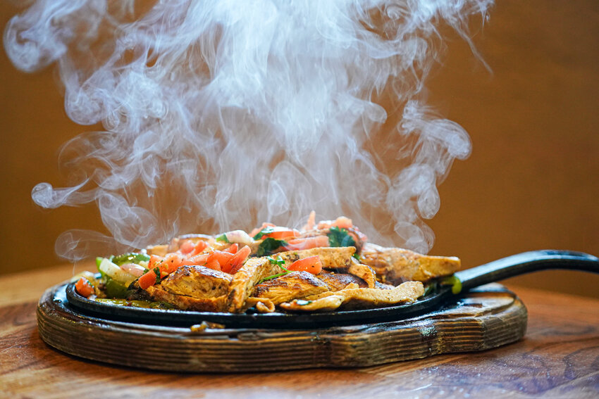 Sizzling chicken fajitas are a customer favorite, not only on Cinco de Mayo, but every day, at Las Salsas.