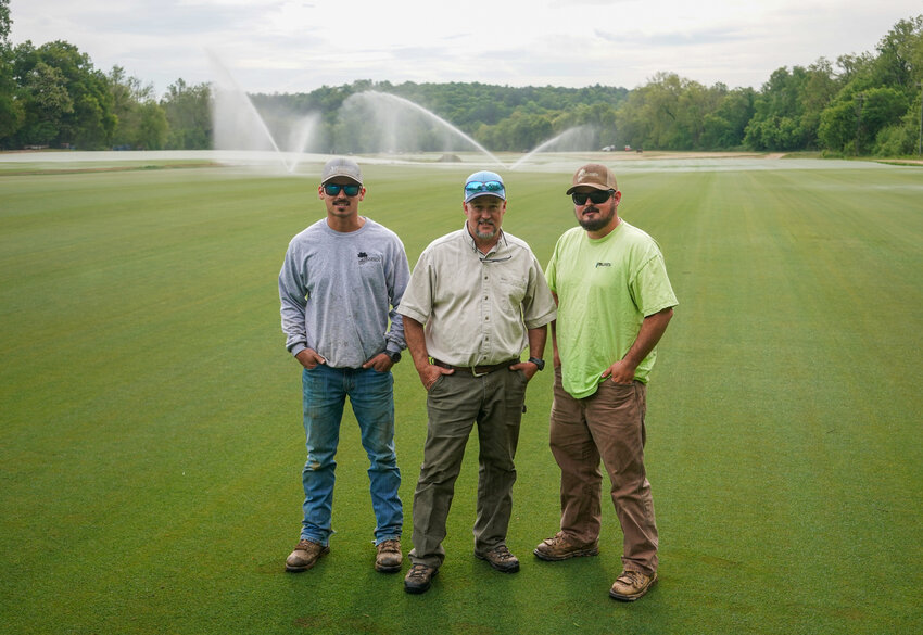 Pro Green, Inc. is a family business that sends high-quality turfgrass sod far beyond the borders of Burke County, including premier golf courses. Pictured here is John Clark, center, with his sons Noah, left, and Hunter. See story on Page 6B.