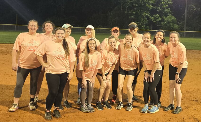 JOSH McKINNEY / THE PAPER
Pictured from the Morganton Peaches are (front row, from left to right) Skyla Gwyn, Natalee Lee, Katie Olsen, Brie Collinson, and Lyndsay Brisson; (back row, from left) Jennifer Horney, Jenna Hughes, Denise Reed, Kelly Holland, Jamie Whisenant, Erin Roudebush, Kara Walton (player-coach), and Courtney Bowman. Not pictured are Shonda Nelson, Melissa Taylor, Amber Seagraves, and Heather Antley.
