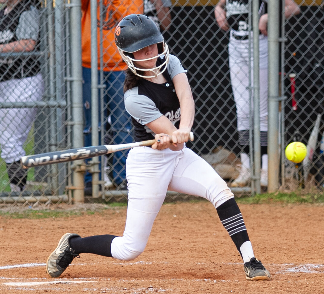 Heritage Middle School's Lindsey Hensley takes a swing at the plate on Thursday as the Lady Eagles softball team visited county foe Walter Johnson in Morganton for a Foothills Athletic Conference doubleheader.