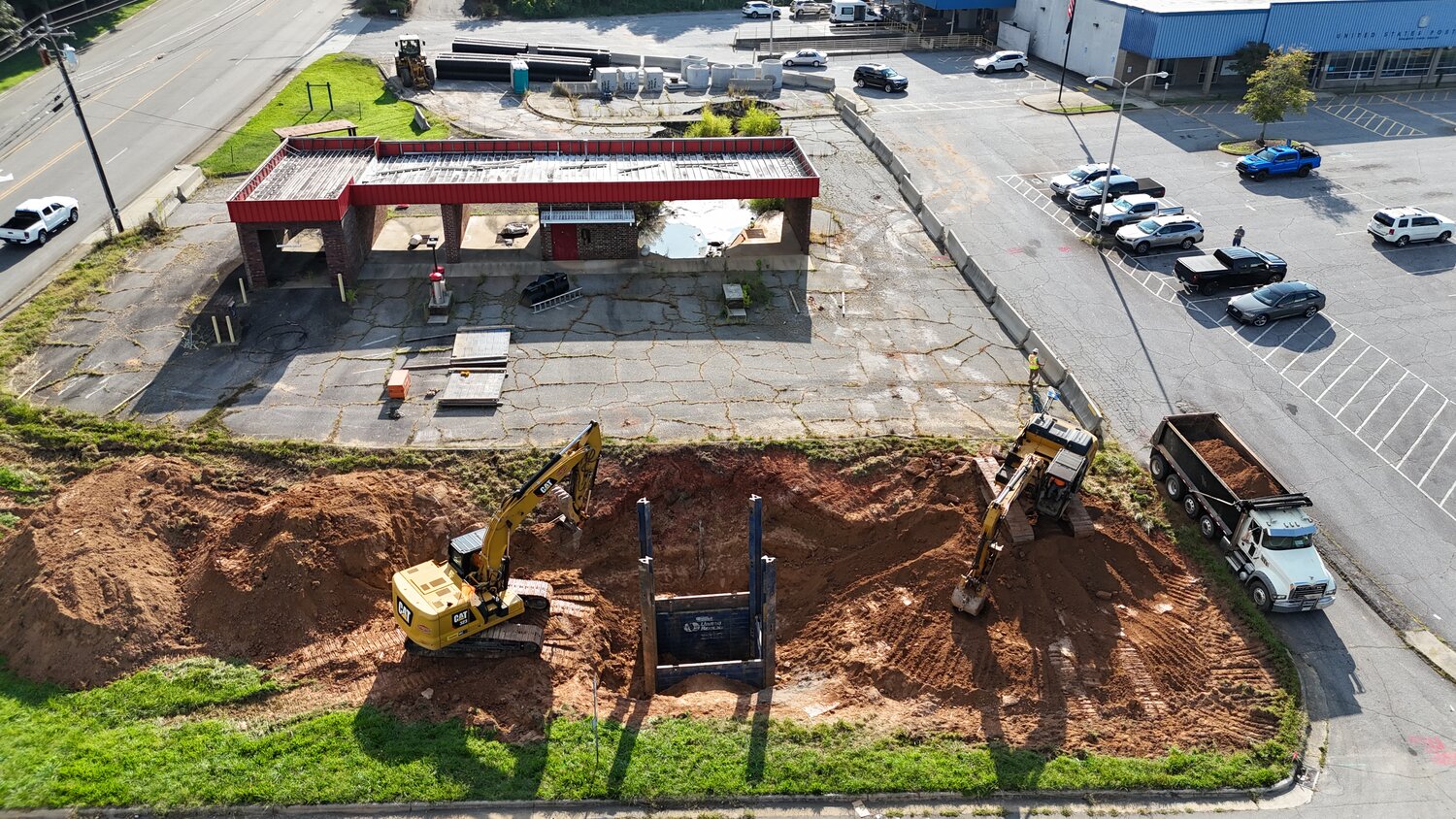 The sinkhole next to the Morganton Post Office is rapidly transforming into 