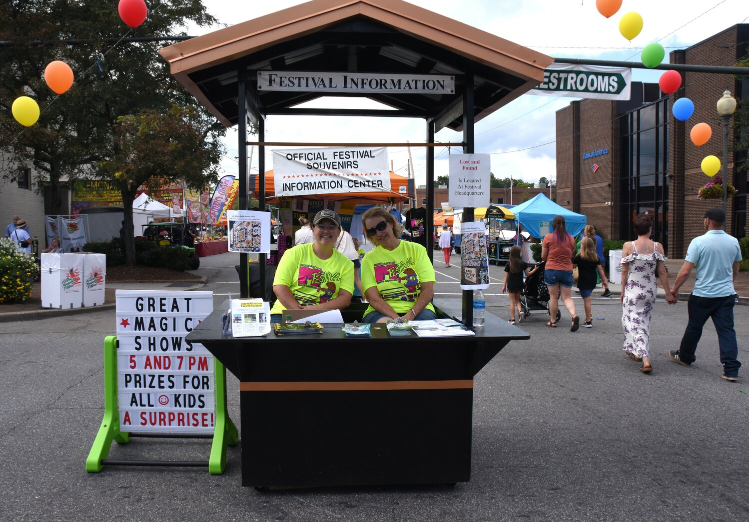 Having Fun, Rain or Shine at the Festival The Paper